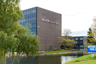 Hilltop Executive Center exterior and pond